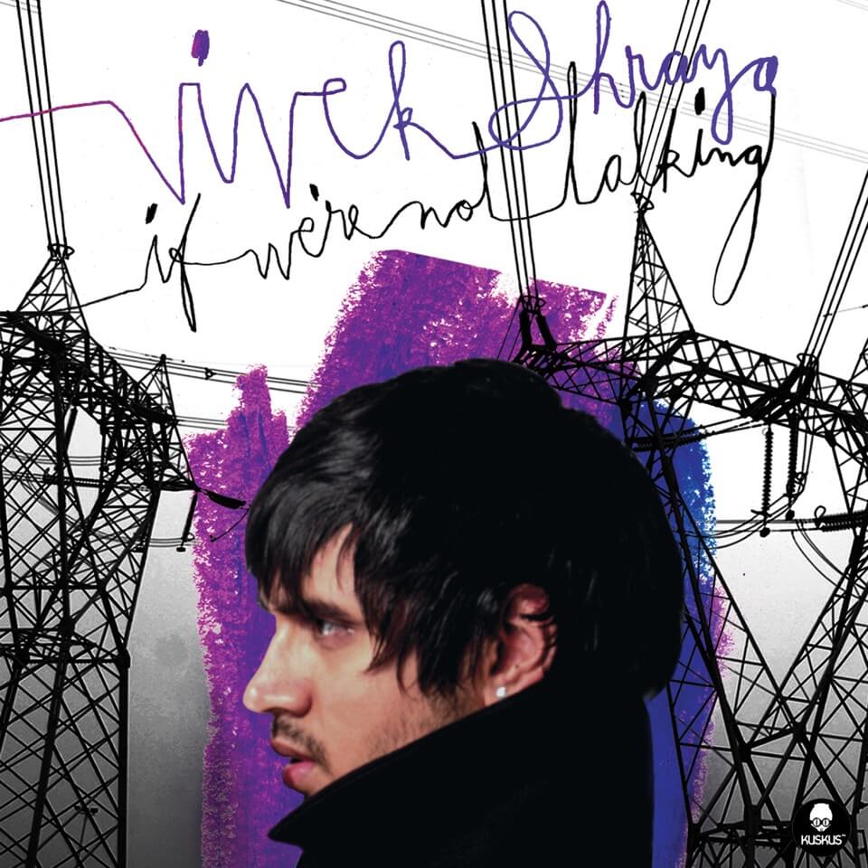 A person’s head in profile and the turned-up collar of their black coat against silhouettes of electrical transmission towers and a wash of blue and purple paint, with scribbled purple and black letters, “Vivek Shraya. If We’re Not Talking.”