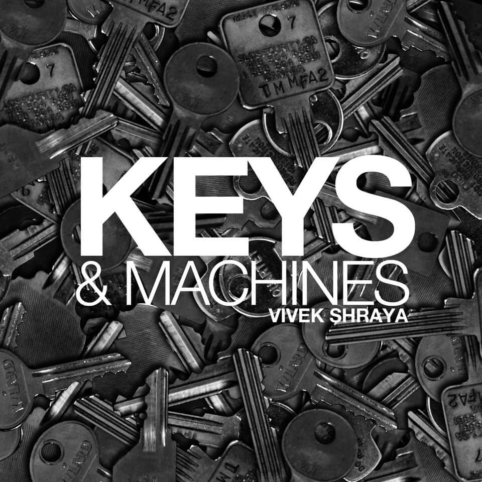 A black-and-white photo of various keys under bold white text, ‘Keys & Machines. Vivek Shraya.’